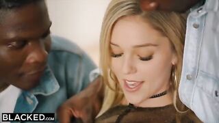 A beautiful blonde woman, Kali Rose, is having fun with six black men