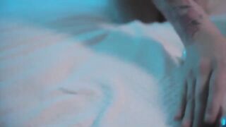 A young and sexy girl caresses herself with a Hitachi Magic Wand