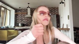 A pretty slut gets her glasses covered with sperm after a hot session