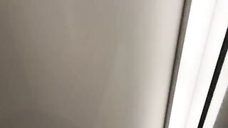 A hot chick is having fun with the salesman in the fitting room
