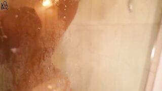 Young girl has sex with a huge dildo in the shower, creating a wet and wild scene