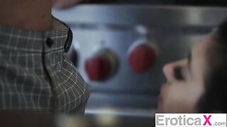 The couple has sex right in the kitchen. It's very hot!