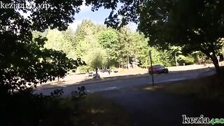 Kezia teaches how to squirt on the public sidewalk in the park