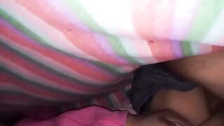A couple enjoys missionary sex under the sheets