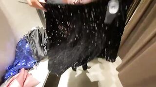 The hot girl is choosing new clothes and gets cum on her tits
