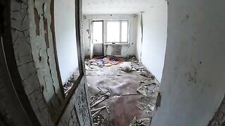 Exhibitionist girl walks through abandoned buildings part 1