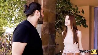 A young ginger girl calmed down after a quarrel, getting intimate with a handsome man
