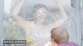 Ruby Sims rubs her big tits on the window cleaner before getting fucked