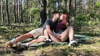 Passionate amateur couple has sex right in the park during a picnic