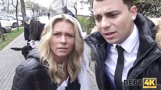 The blonde is having sex with a collector before her husband
