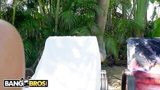 Julianna Vega shakes big tits and ass for stalker by the pool