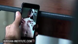 A petite girl warms up her boyfriend with a video call