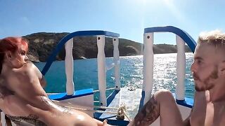 A couple is having fun on a boat and getting messy with oil