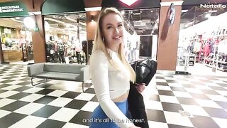 A big ass blonde is fucking in the shopping mall toilet for money