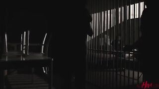Two women share a passionate and intimate moment behind bars in this erotic tale