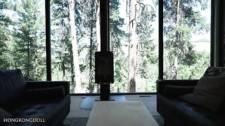 A sexy woman lives in the woods, far from civilization, in a homemade home