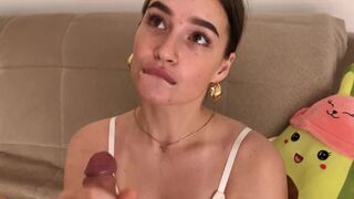 The cute girl gave her boyfriend a gentle blowjob