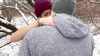 A wife is getting creampied by her husband and friend in the snow