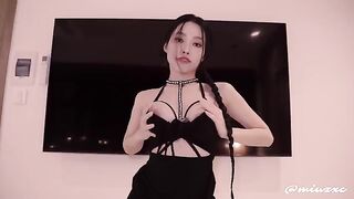An Asian girl in a black dress was fucked and made to squirt, with cum inside her