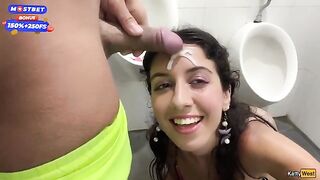 The guy made a cumshot on the face of the girl in public toilet