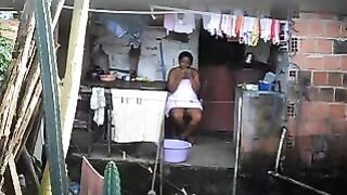 A black woman did not know about the hidden camera in the room