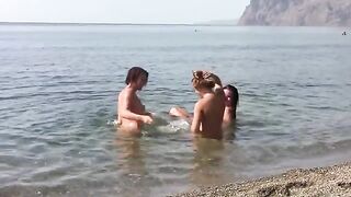 Three bare beauties on the public beach