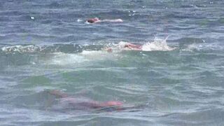 A mature woman went to the nude beach to relax and sunbathe