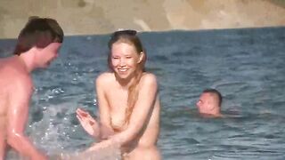 A mature woman went to the nude beach to relax and sunbathe