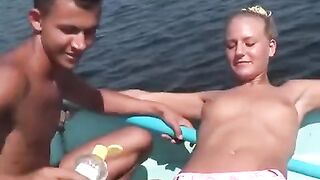 A group of young people has debauchery on the riverbank