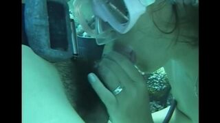 A man has sex with a hairy woman under the water