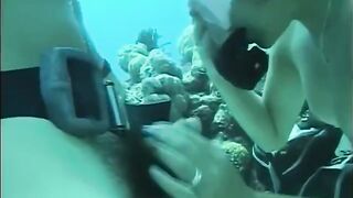 A man has sex with a hairy woman under the water