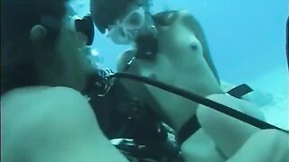 A man has sex with a hairy woman under the water