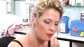 A girl with a pierced clitoris plays with sex toys