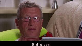 A young girl is having fun with older guys, exploring their desires