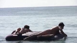 Nude beauties have sex on the sandy coast