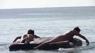 Nude beauties have sex on the sandy coast