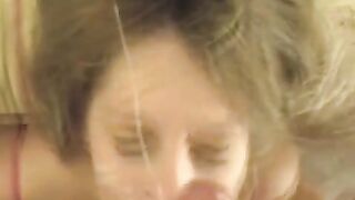 A hot cum shot on the girl’s face after blowing a dick