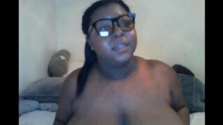 The black woman closed the camera with her huge natural tits