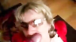 A woman with large breasts has sex while dressed in latex, showcasing her fetish