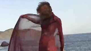 A girl with small boobs gets naked in the rain and has sex