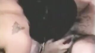 The man has sex with a strapon and another girl