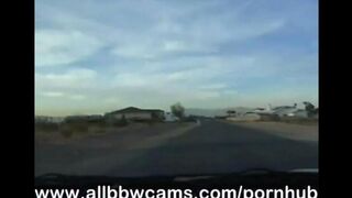 A fat woman shows her big boobs and wet pussy