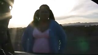 A fat woman shows her big boobs and wet pussy