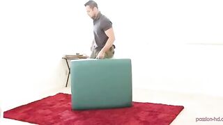 A masseur has sex with his client on the couch