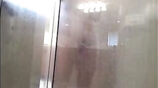 A man washes himself in the shower, but there’s a camera watching