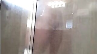 A man washes himself in the shower, but there’s a camera watching
