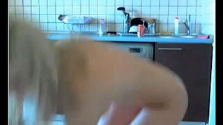 The guy masturbates virgin camgirl in the kitchen