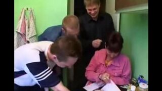 Hot Russian mom with natural tits enjoys a steamy foursome in the kitchen