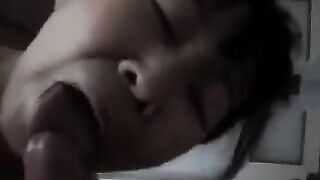 An adult Chinese woman practices on him with her mouth