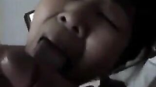An adult Chinese woman practices on him with her mouth